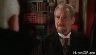 Man in Tuxedo Talking to Man in Suit