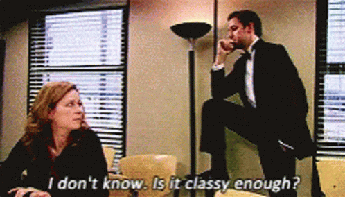 Man in Tuxedo Talking to Woman