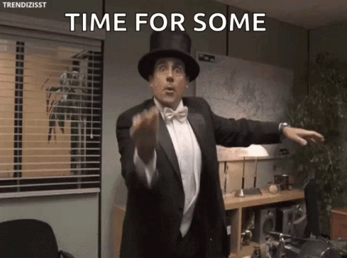 Man in Tuxedo Top Hat Says Time For Some