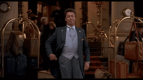 Man in Tuxedo With 88 Pin