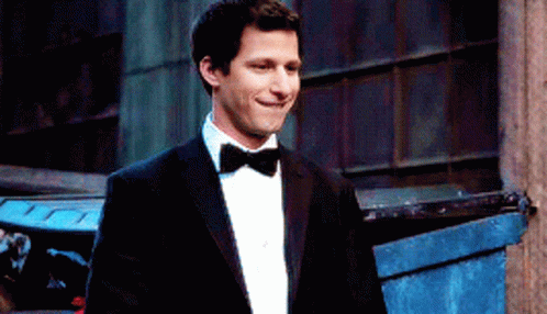 Man in Tuxedo With Bow Tie Smiling