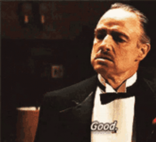 Man in Tuxedo with Ring Looking at Something
