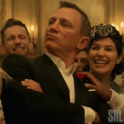 Man in Tuxedo with SNL Logo