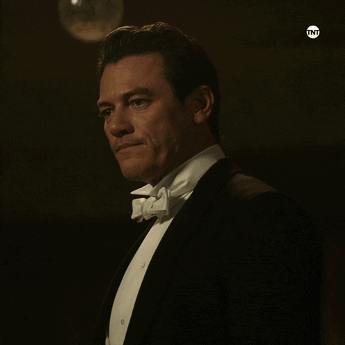 Man in Tuxedo With TNT on Bottom Right