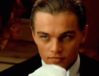 Man In Tuxedo With White Gloves Close Up GIF