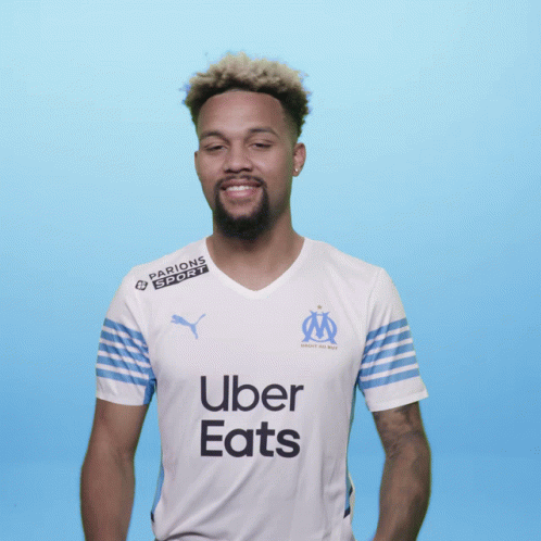 Man in Uber Eats Shirt Clapping