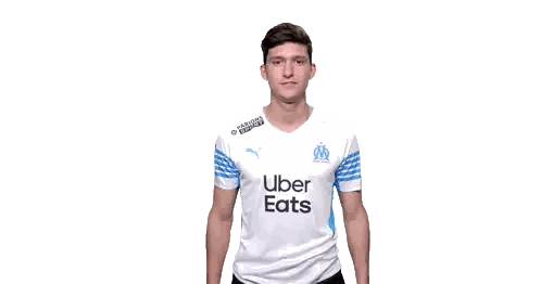 Man In Uber Eats Shirt Giving Thumbs Up