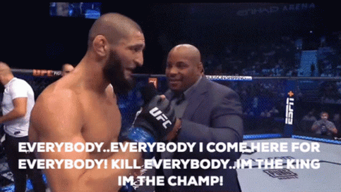 Man in UFC Glove Talking to Suit