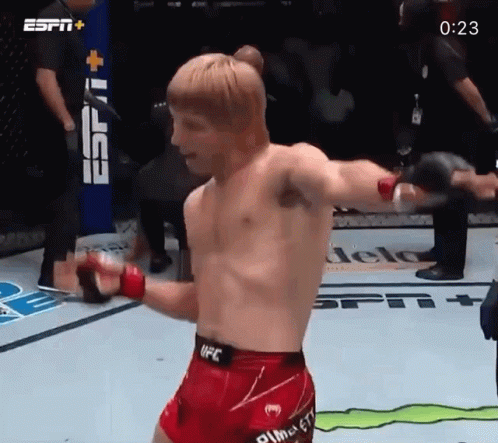 Man In UFC Shorts Standing In Ring GIF