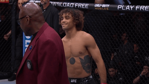 Man In UFC Uniform Says Play Free GIF