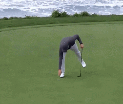 Man In Under Armour Holding Golf Club GIF