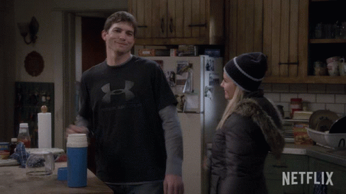 Man in Under Armour Shirt Next to Woman