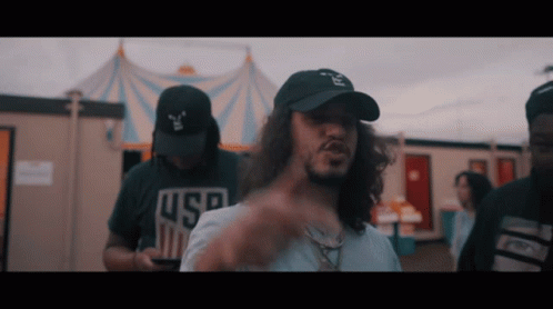 Man In USA Shirt At Carnival GIF