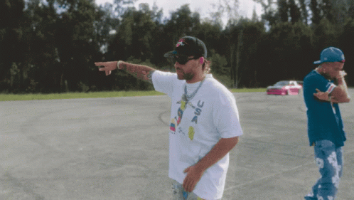 Man in USA T-Shirt in Parking Lot