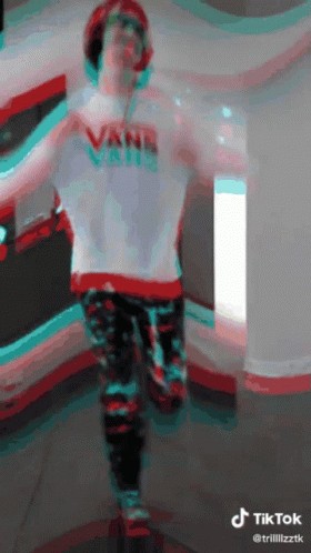 Man in Vans Shirt Dancing