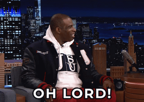 Man in Varsity Jacket Saying Oh Lord at Mic