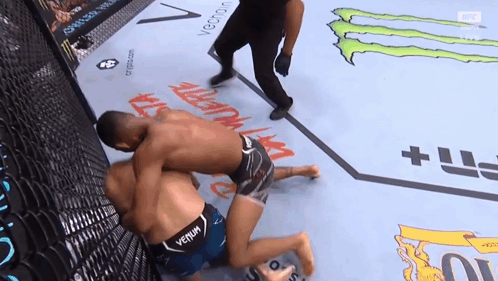 Man In Venom Shirt Wrestling Another Man GIF