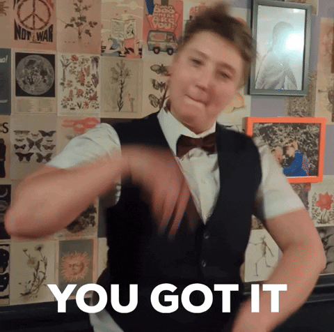 Man in Vest and Bow Tie Thumbs Up Saying You Got It