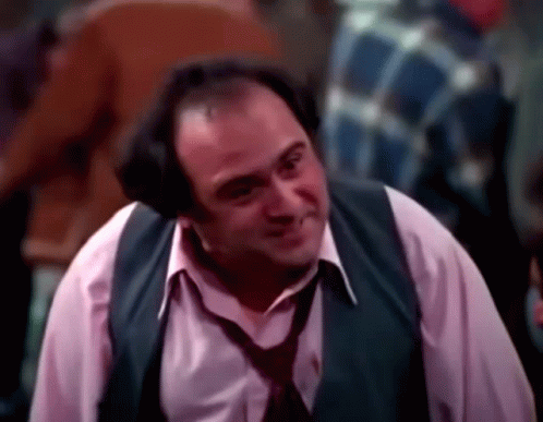 Man In Vest And Tie Smiling GIF