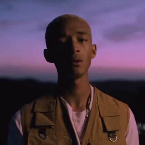 Man In Vest Purple Sky GIF