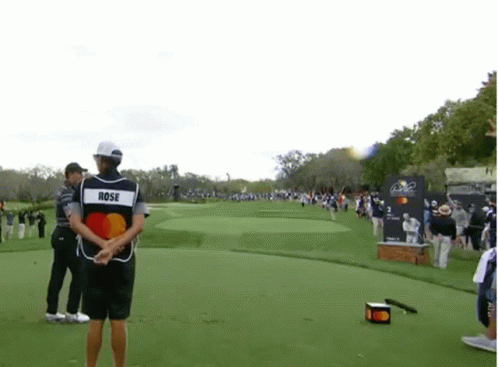 Man In Vest Saying Rose On Golf Course GIF