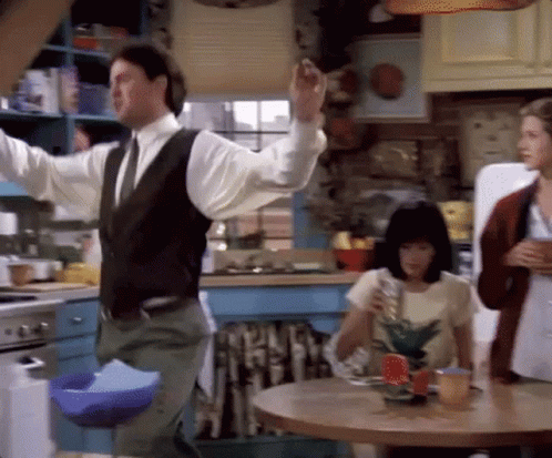 Man In Vest Tie Dancing Kitchen GIF
