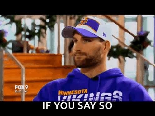 Man in Vikings Sweatshirt and Cap Saying If You Say So