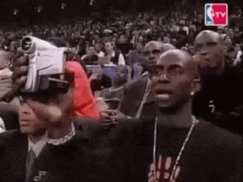 Man In VR Headset Watching Basketball Game GIF