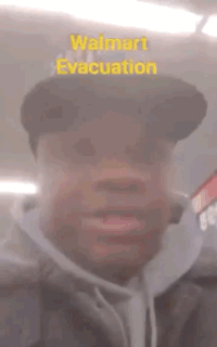 Man In Walmart Evacuation Hat Making Funny Face GIF