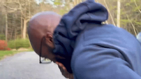 Man In Wayne Reynolds Hat With Others GIF