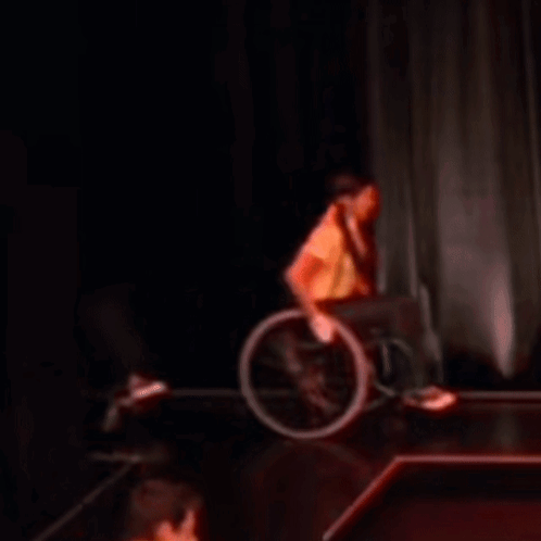 Man In Wheelchair Dancing On Stage GIF