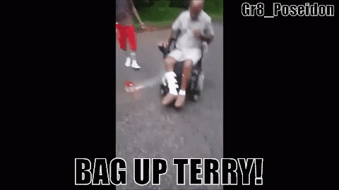Man in Wheelchair Pushed by Skateboarder