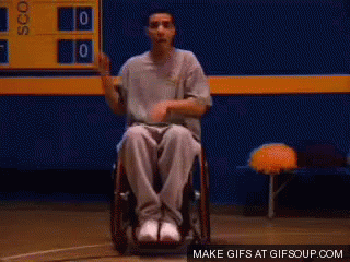 Man in Wheelchair Waving Hands