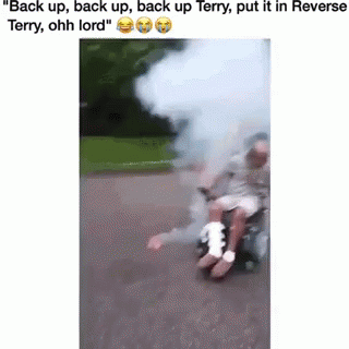 Man in Wheelchair With Bandage Pushed by Another Man