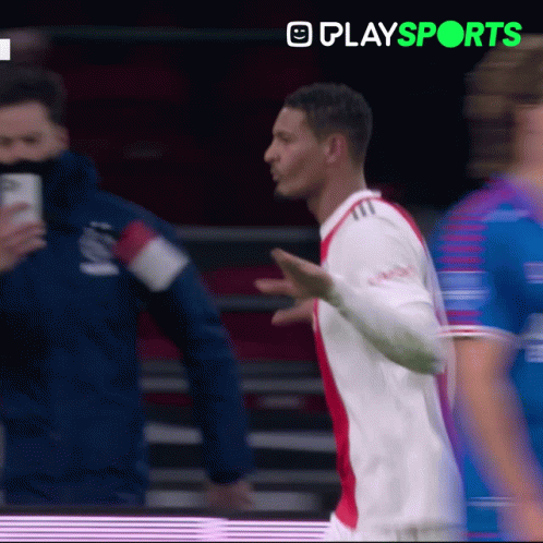 Man In White And Red Soccer Jersey With Playsports GIF