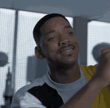 Man In White And Yellow Shirts Smiling GIF