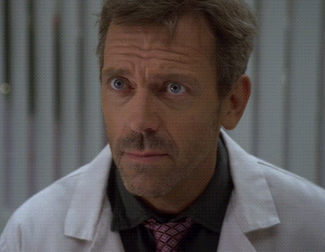 Man in White Coat and Pink Tie