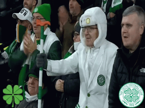 Man in White Coat with Celtic Logo