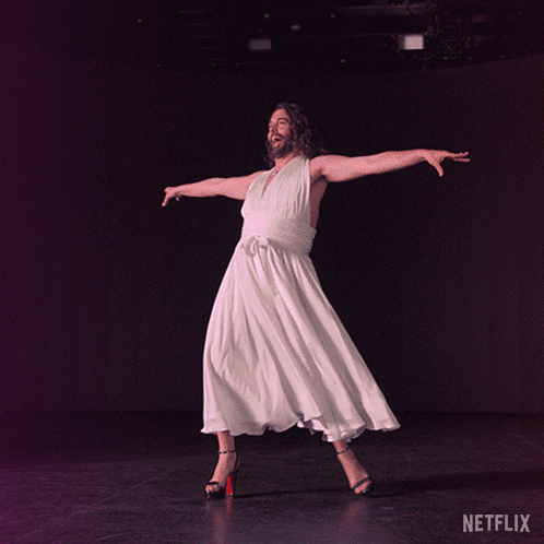Man in White Dress and High Heels Dancing Netflix Logo