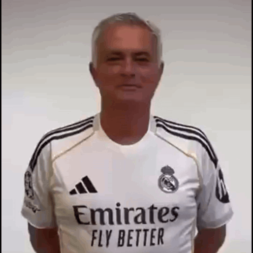 Man in White Emirates Fly Better Shirt