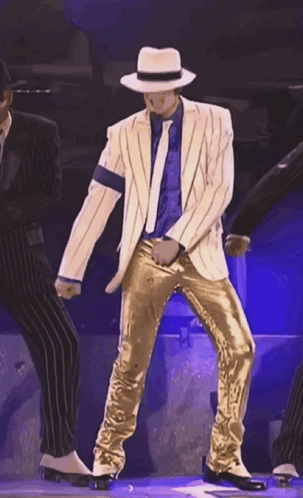 Man In White Hat And Gold Pants Dancing GIF