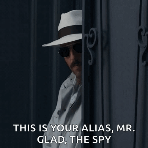 Man in White Hat and Sunglasses Says This Is Your Alias