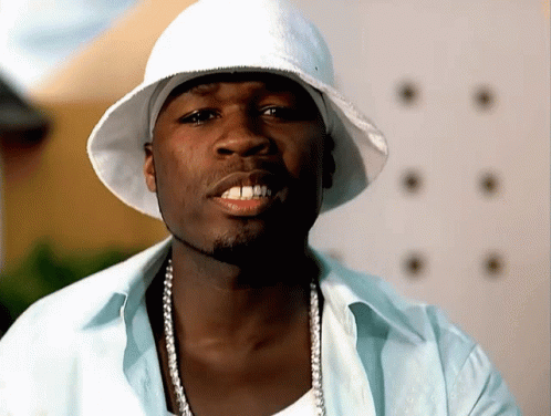 Man in White Hat and White Shirt Smiling