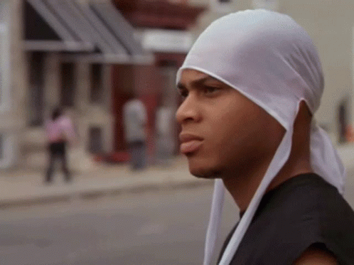 Man in White Head Scarf