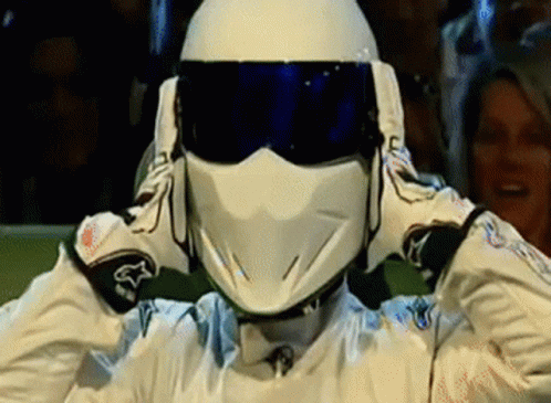 Man in White Helmet and Gloves With Fox Logo