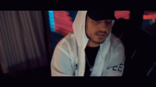 Man In White Hoodie And Black Hat With Letter E GIF