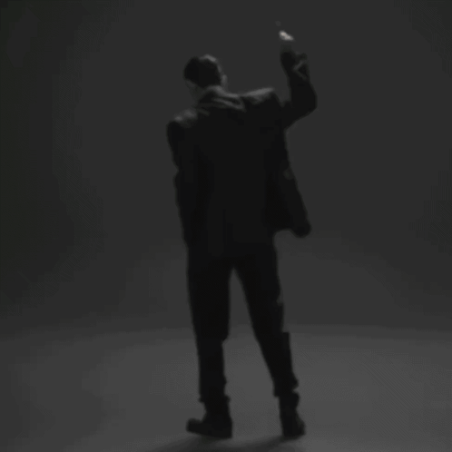 Man in White Hoodie and White Pants Dancing