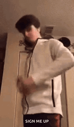 Man in White Jacket Making Funny Face at Door