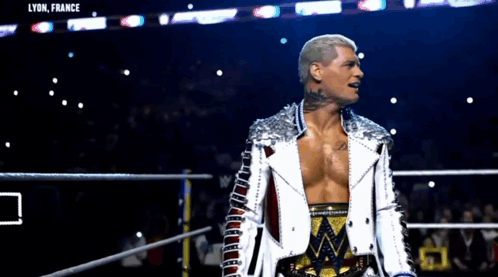 Man in White Jacket Standing in Ring Lyon France