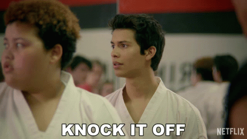 Man In White Karate Uniform With Knock It Off Text GIF